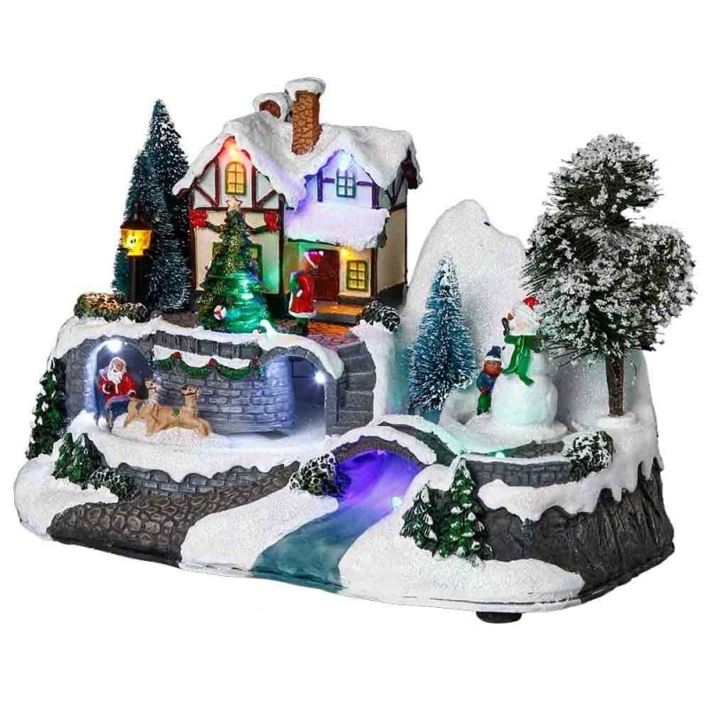 Village de Noël maison avec bonhomme de neige